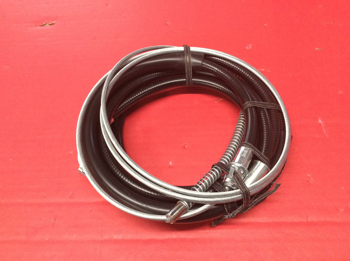 1966 Mustang Rear Parking Brake Cable One Piece does both rear wheels. Measures 160 1/4