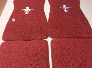 1966-1973 Mustang Maroon Carpeted Pony Floor mats with Pony & Bars Logo on Front Mats Rear Mats Plain Set of 4. These are dark red/maroon which was original color for 1966-1973.